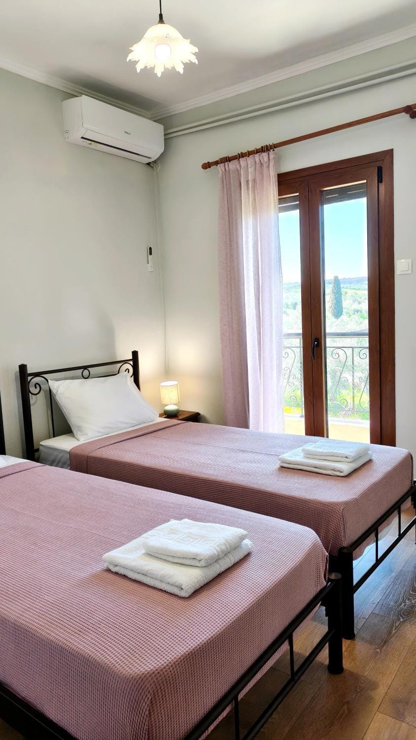 Bed, View (from property/room), Decorative detail, towels, air conditioner