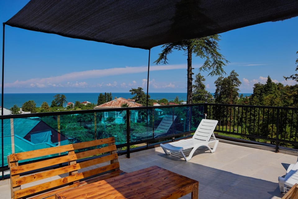Patio, Day, Balcony/Terrace, Living room, Seating area, Dining area, Pool view, Sea view, Swimming pool