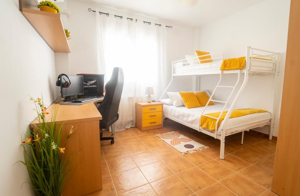 Communal lounge/ TV room, Bed, TV and multimedia, Living room, Photo of the whole room, Seating area, Evening entertainment, Bedroom, bunk bed, air conditioner