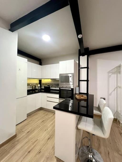 TV and multimedia, Kitchen or kitchenette, Dining area, dishwasher, microwave, oven, stove, toaster, air conditioner