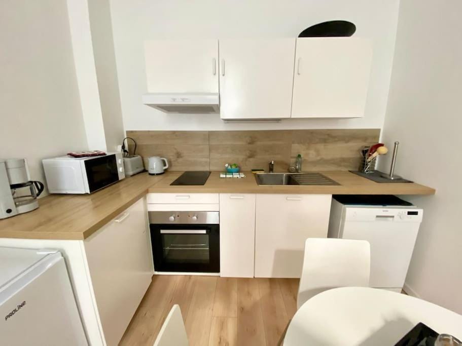 Kitchen or kitchenette, oven, stove, toaster