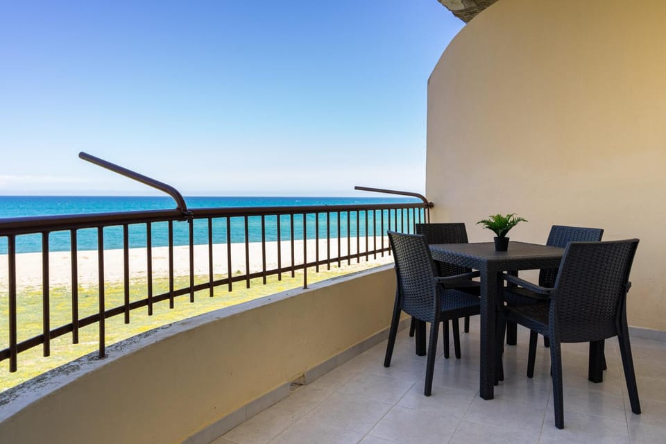 Property building, Patio, Day, Natural landscape, View (from property/room), Balcony/Terrace, Living room, Seating area, Dining area, Sea view