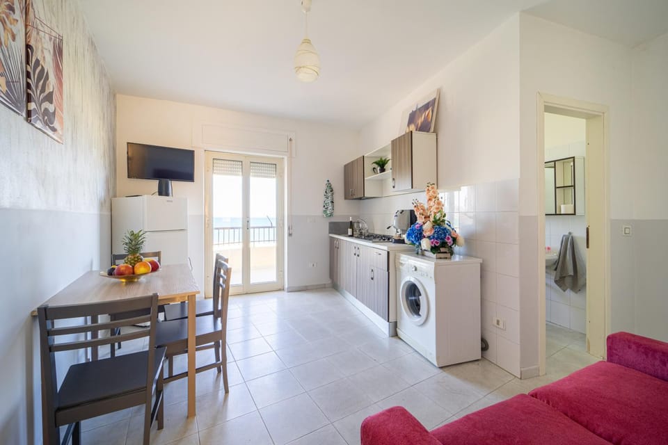 TV and multimedia, Kitchen or kitchenette, Living room, Seating area, Dining area, oven, stove, washing machine