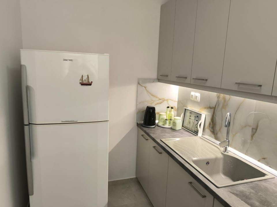 Kitchen or kitchenette, oven, stove