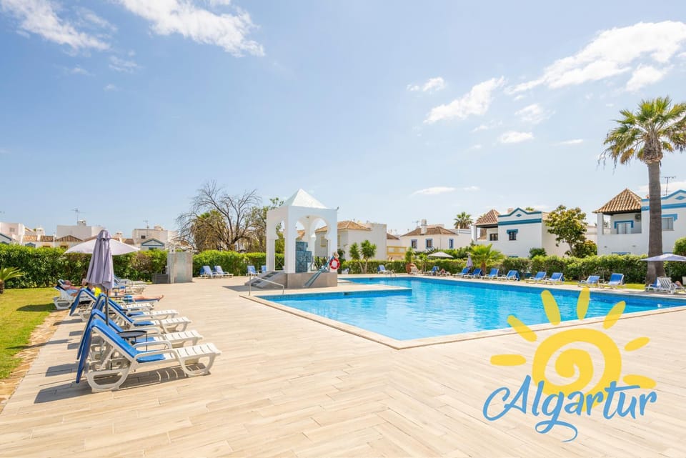 Swimming pool, sunbed