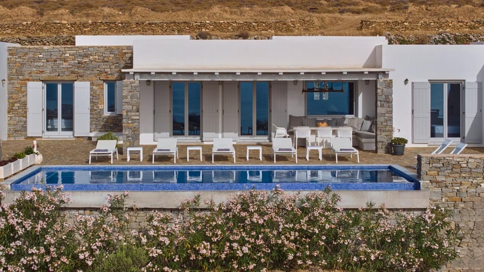 Property building, Patio, Pool view, Swimming pool, sunbed