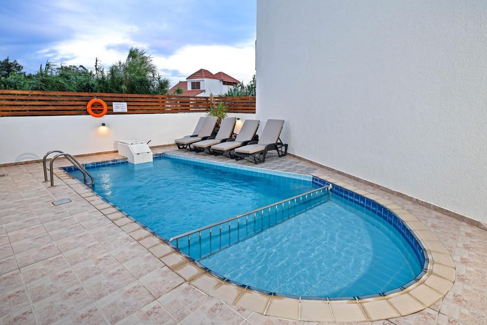 Patio, Day, Pool view, Swimming pool, sunbed