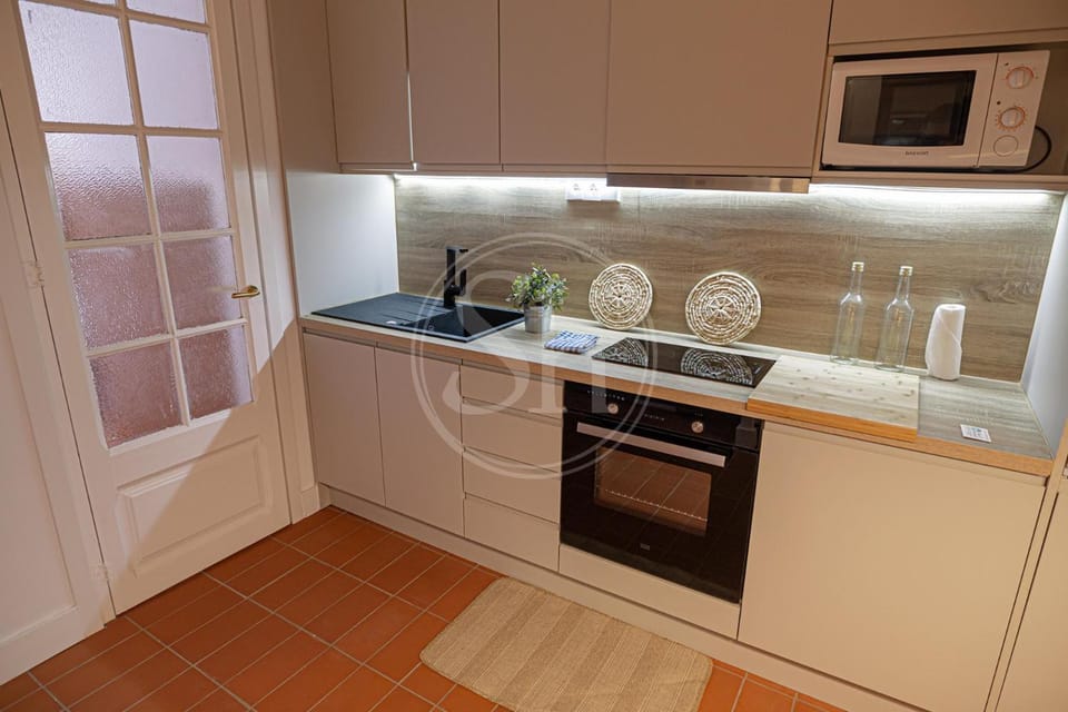 Kitchen or kitchenette, stove