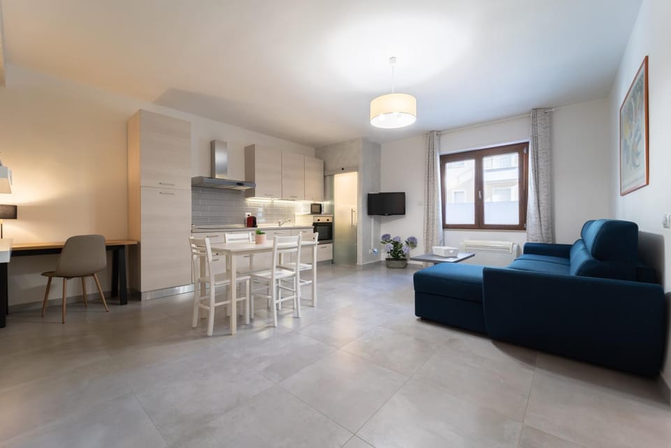 Kitchen or kitchenette, Living room, Seating area, Dining area, stove