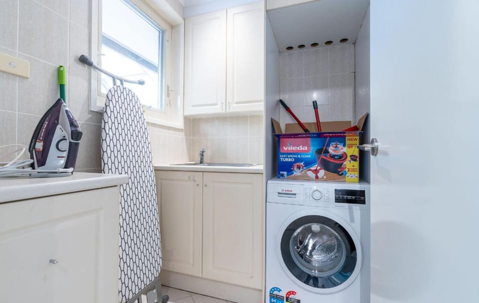 Kitchen or kitchenette, dishwasher, washing machine, dryer
