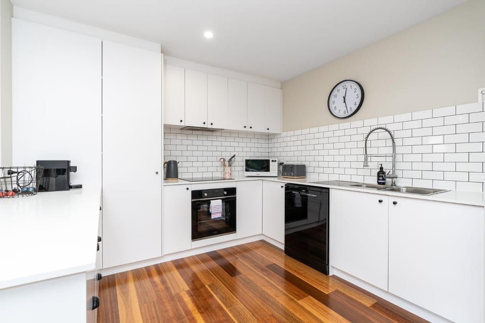 Kitchen or kitchenette, dishwasher, oven, stove, toaster