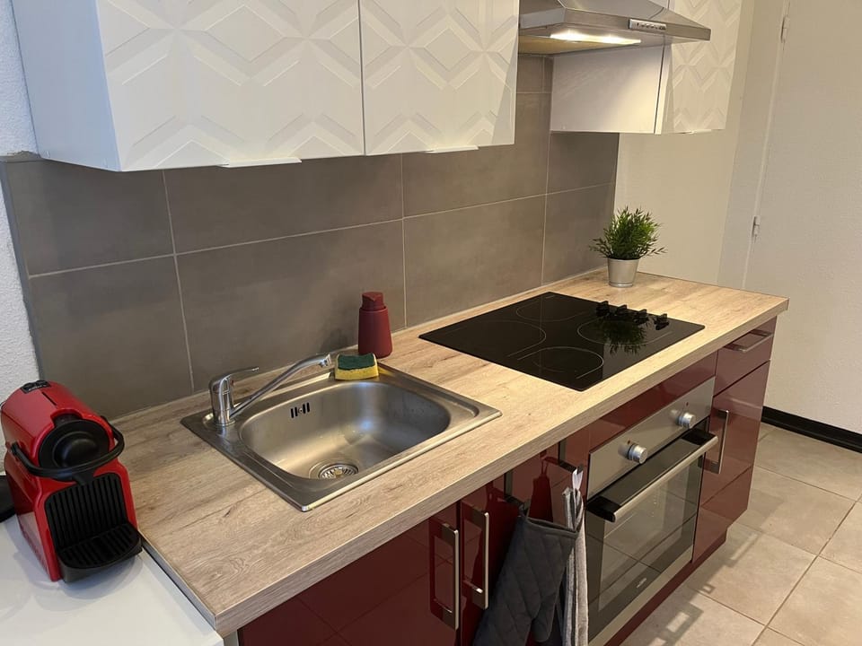 Kitchen or kitchenette, stove