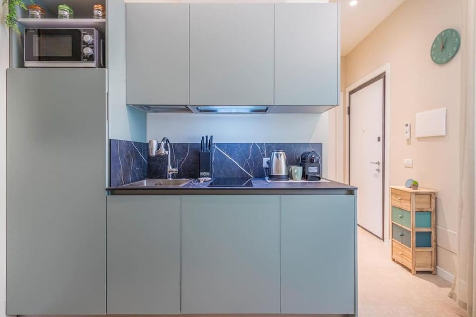 Kitchen or kitchenette, stove, toaster