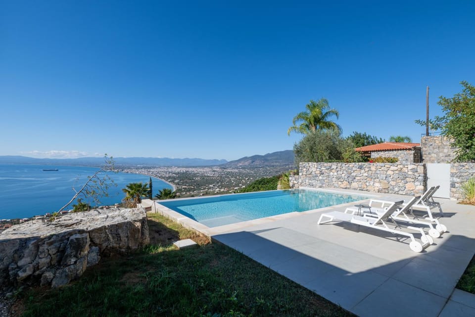 Patio, Nearby landmark, Day, Natural landscape, Mountain view, Pool view, Sea view, Swimming pool, sunbed