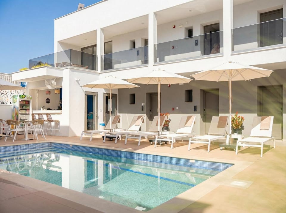 Property building, Day, View (from property/room), Lounge or bar, Pool view, Swimming pool, sunbed