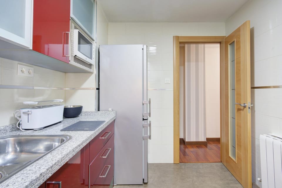 Kitchen or kitchenette, oven, stove