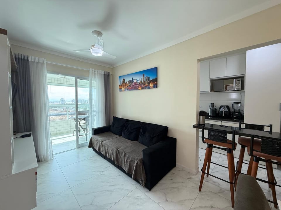 Apartamento Vista Mar Mirim 2 Dormitorios suite com Wifi para até 8 pessoas 1 vaga de estacionamento Apartment in State of São Paulo