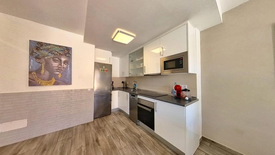 Kitchen or kitchenette, oven, stove