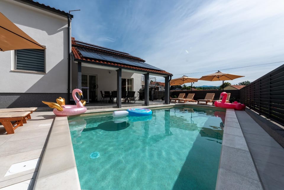 Property building, Patio, Pool view, Swimming pool