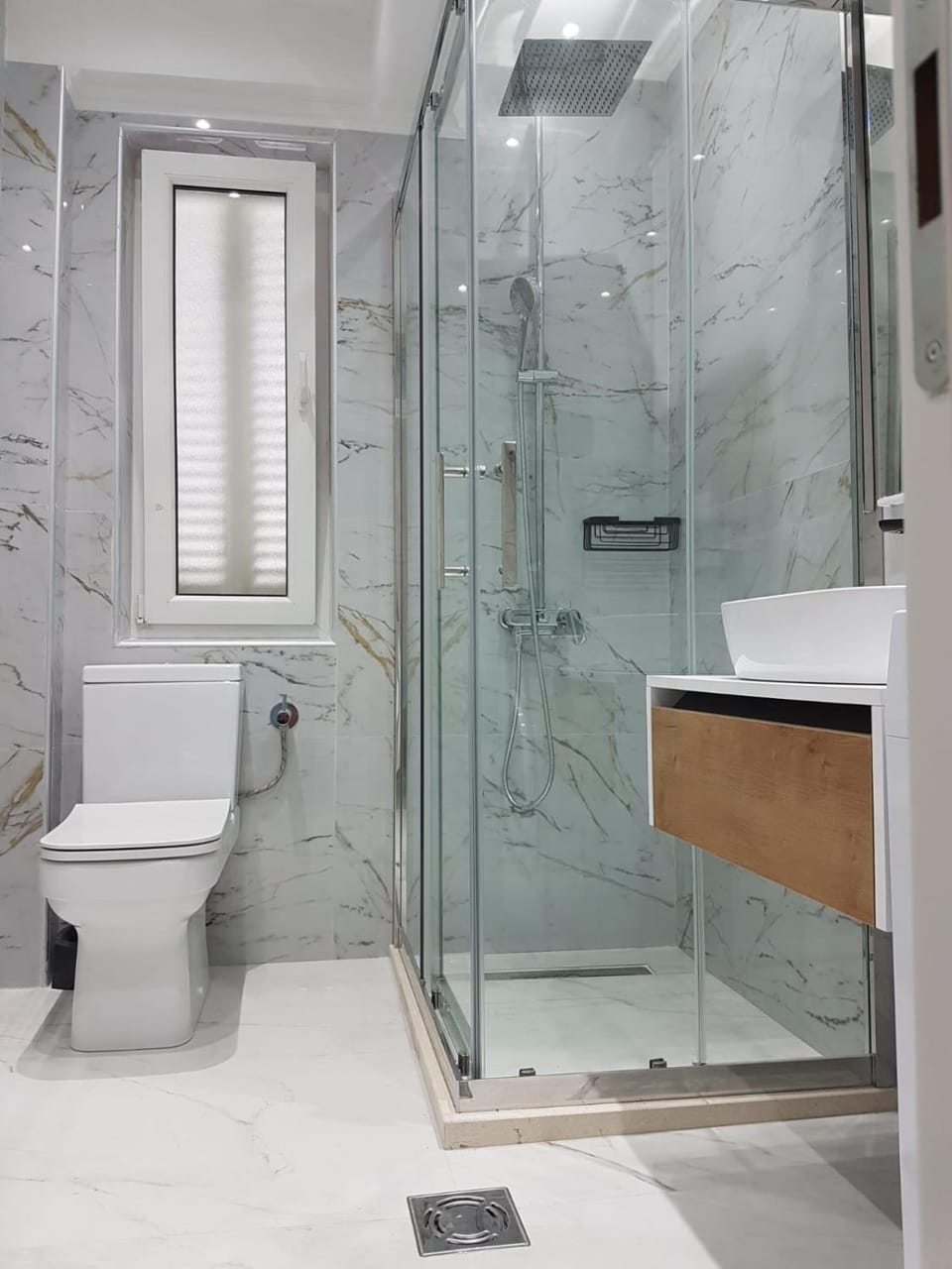 Shower, Toilet, bidet, towels