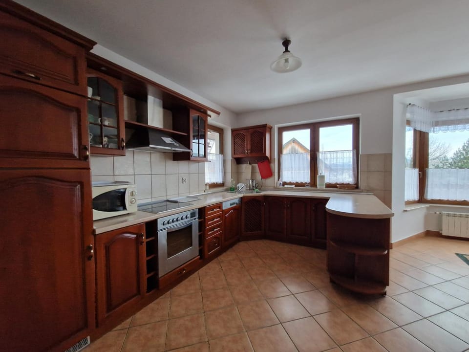 Kitchen or kitchenette, dishwasher, microwave, stove