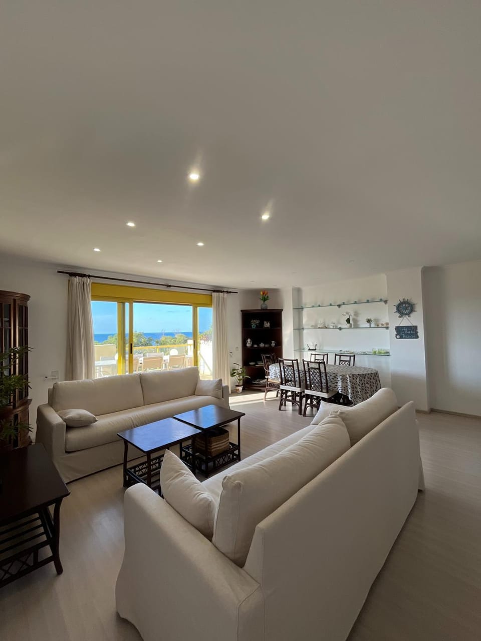 View (from property/room), Living room, Seating area, Dining area, Sea view