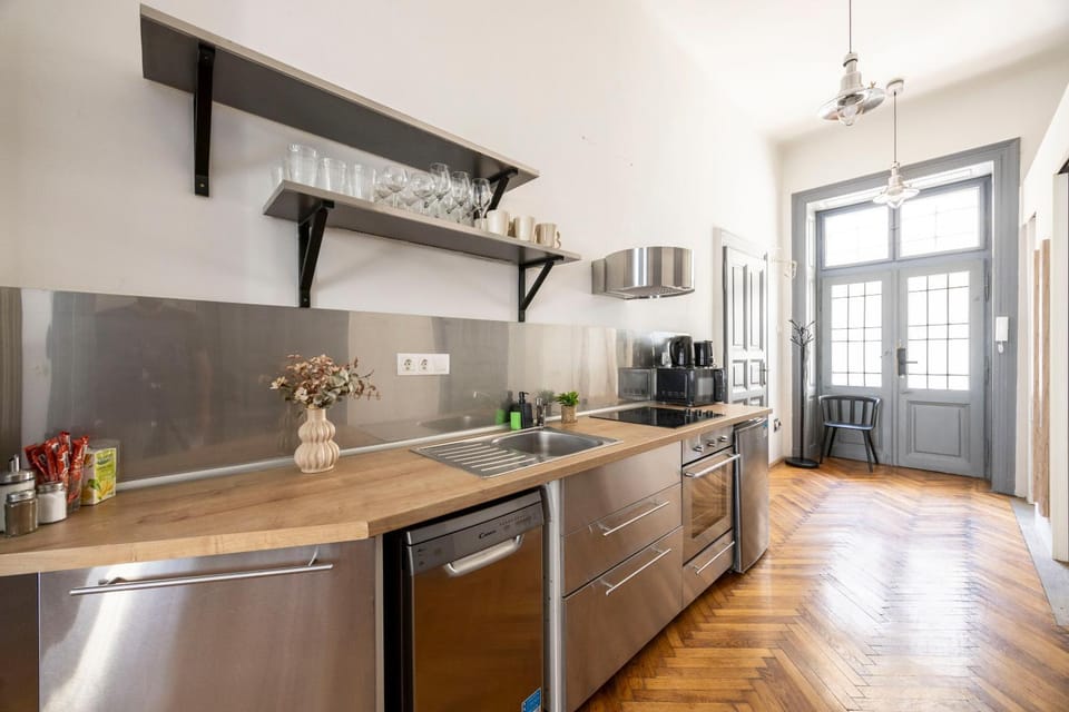 Kitchen or kitchenette, dishwasher, oven, stove