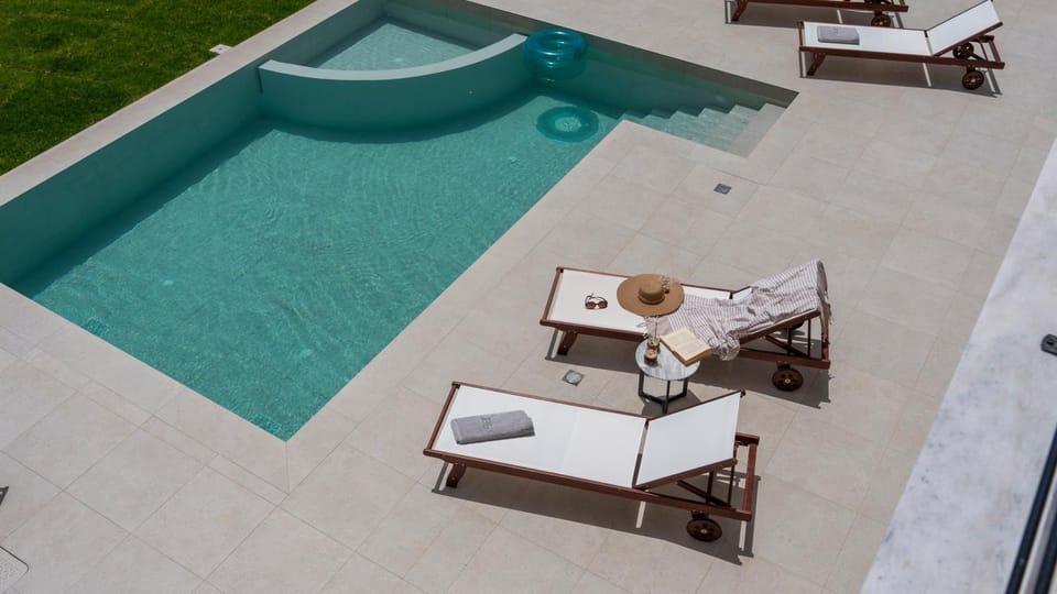 Patio, Day, Natural landscape, Pool view, Swimming pool, sunbed