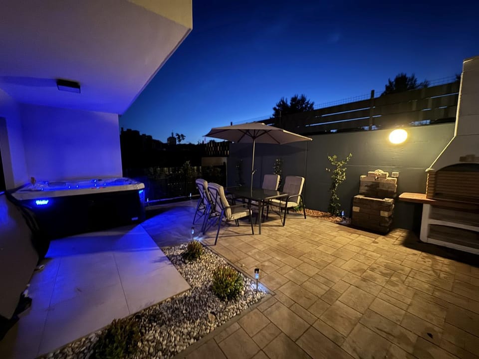 Patio, Night, Hot Tub, Balcony/Terrace, Seating area