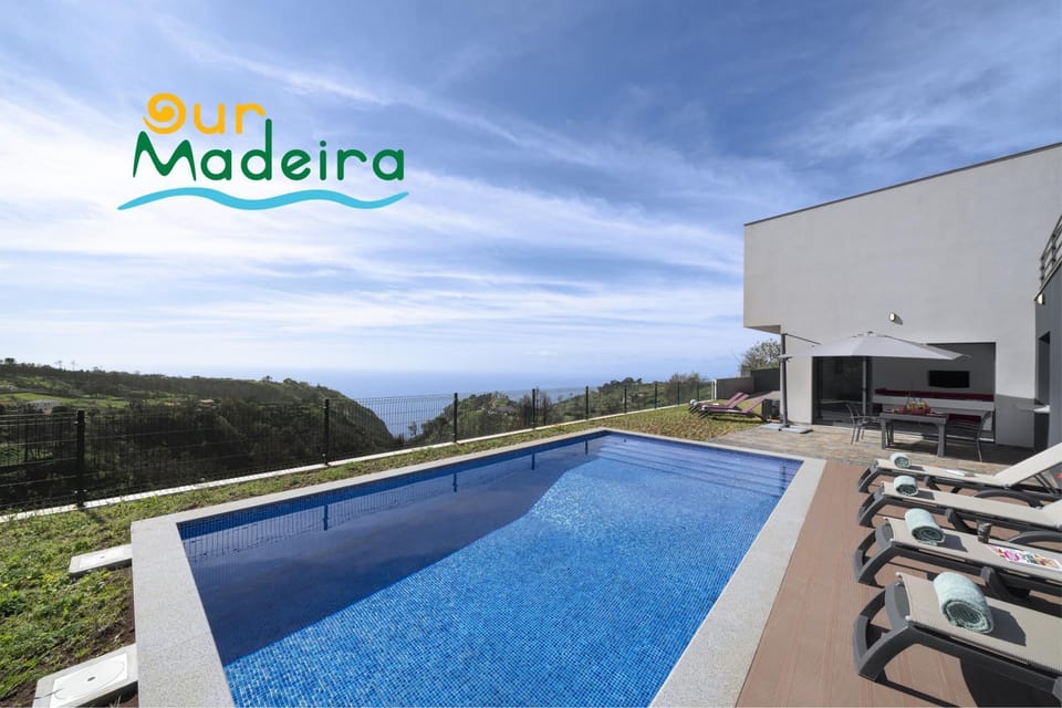 Property building, Patio, Day, Natural landscape, Other, Text overlay, Mountain view, Pool view, Swimming pool, sunbed