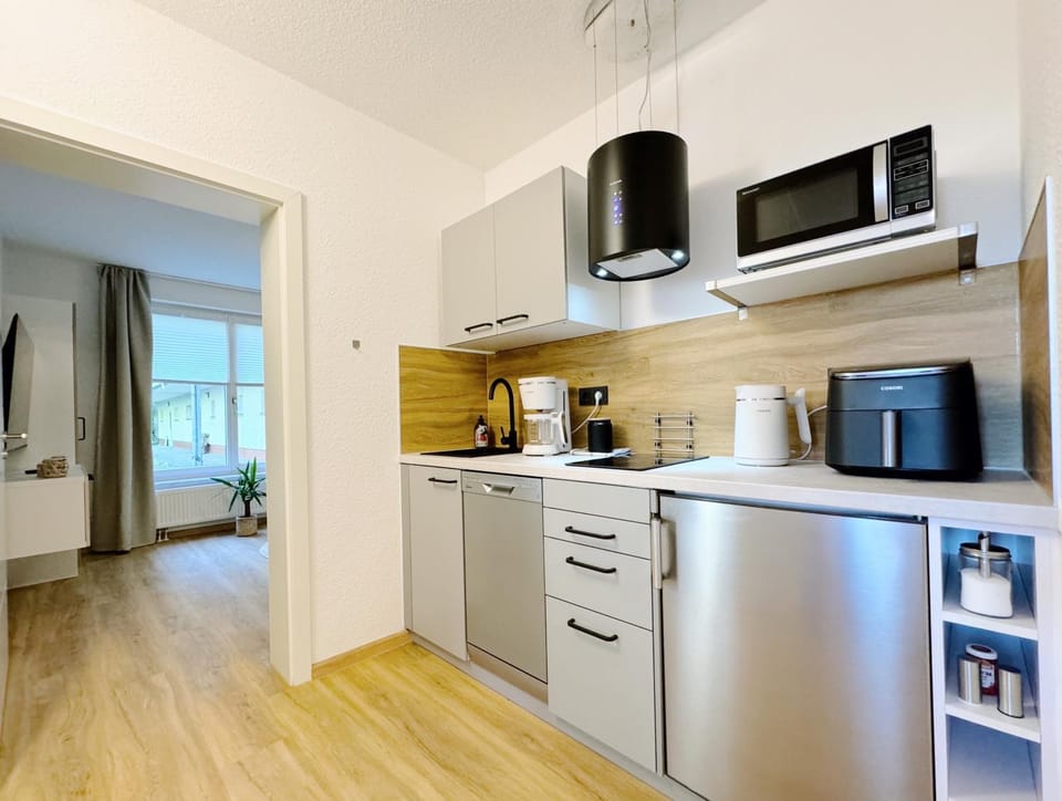 Coffee/tea facilities, Kitchen or kitchenette, dishwasher, microwave, minibar, stove, kitchen