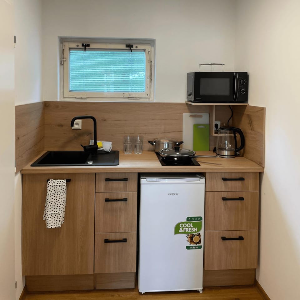 Kitchen or kitchenette, stove