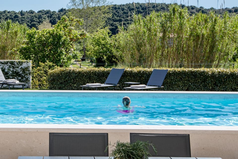 Swimming pool, sunbed