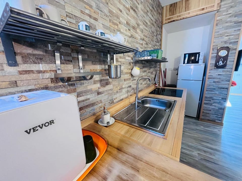 Kitchen or kitchenette, stove