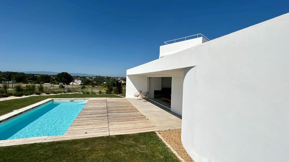 Property building, Day, Pool view, Swimming pool, sunbed