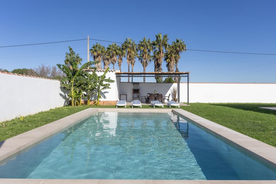 Property building, Living room, Swimming pool