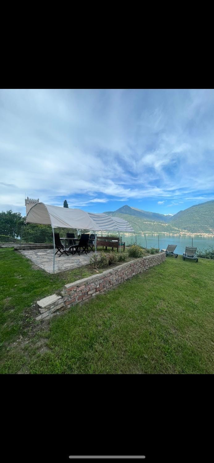 Property building, Natural landscape, Lake view, Mountain view