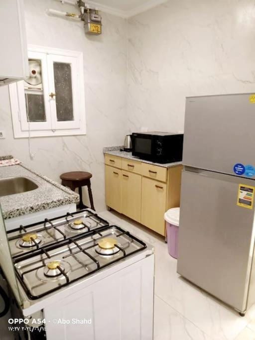 Kitchen or kitchenette, oven