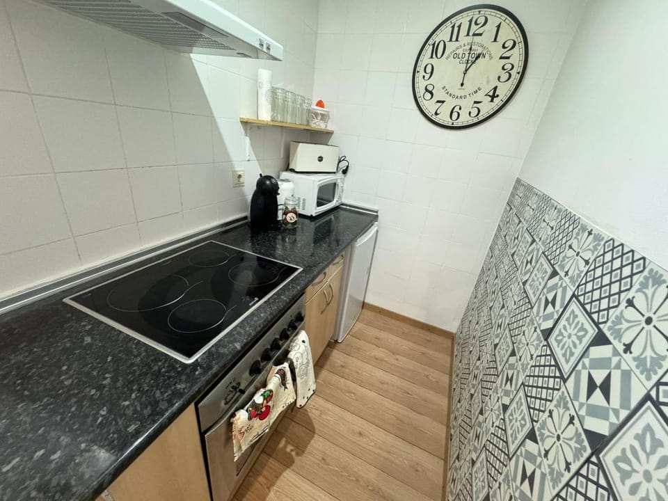 Kitchen or kitchenette, stove