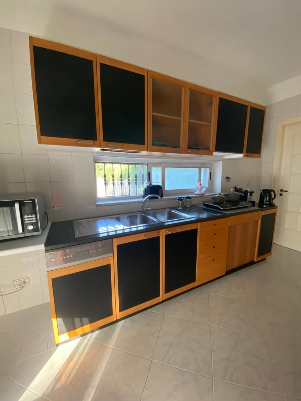 Kitchen or kitchenette, stove, toaster