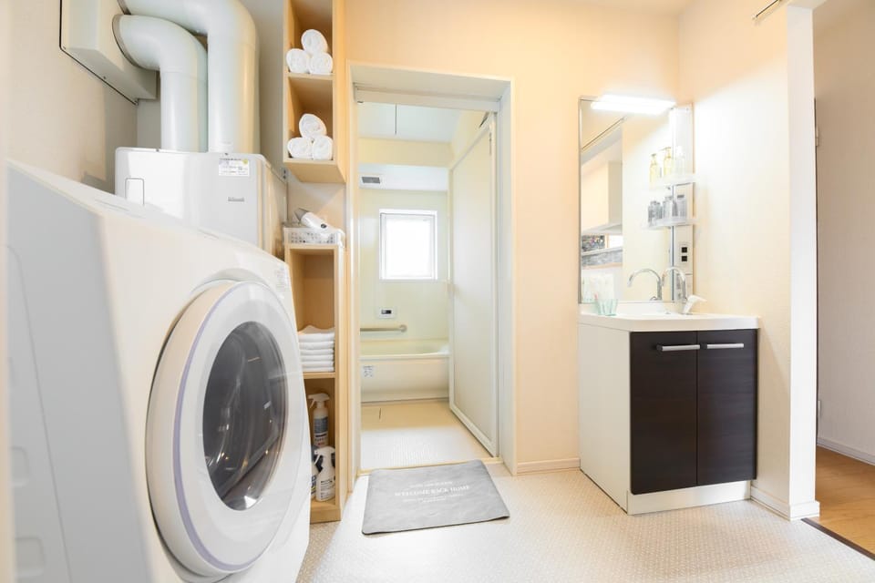 Bathroom, washing machine, dryer