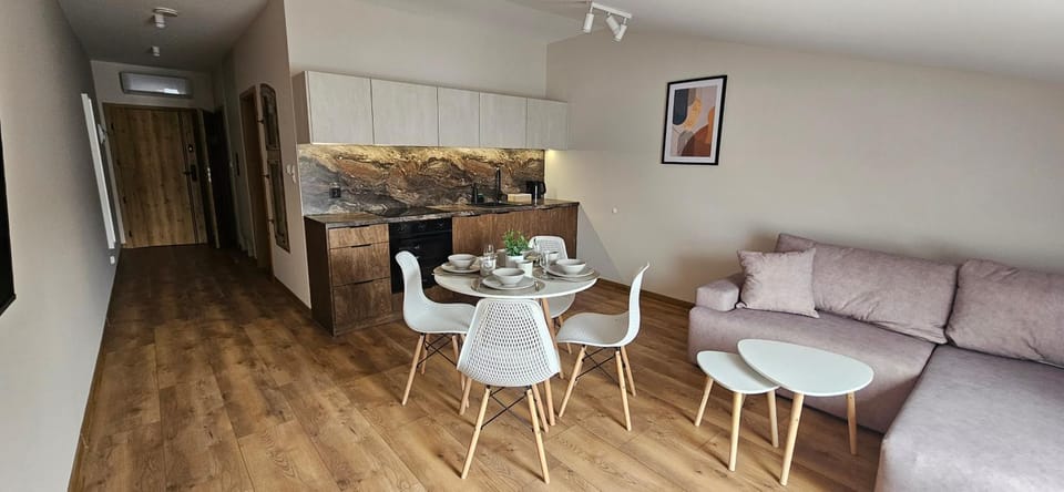 Kitchen or kitchenette, Living room, Seating area, Dining area