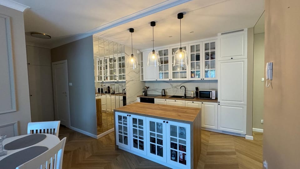 Kitchen or kitchenette, dishwasher, oven, stove, toaster