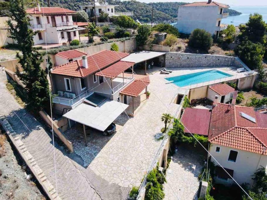Property building, Patio, Day, Natural landscape, Pool view, Sea view, Swimming pool, sunbed
