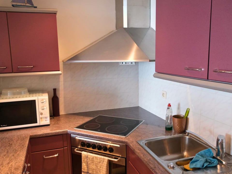 Kitchen or kitchenette, stove, kitchen