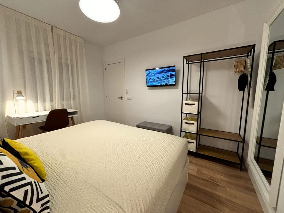 Bed, TV and multimedia, Seating area, Bedroom, flat iron, wardrobe