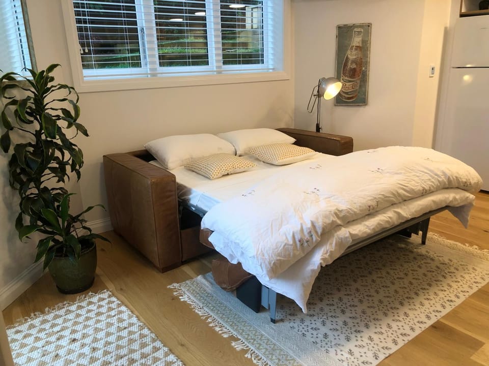 Bed, Living room, Seating area