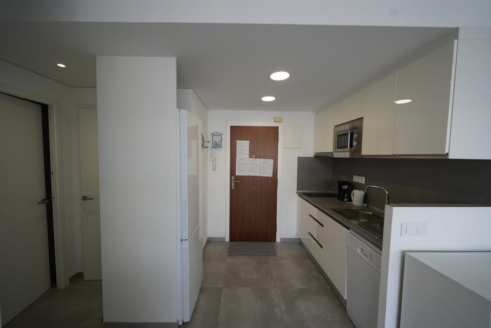 Kitchen or kitchenette, oven