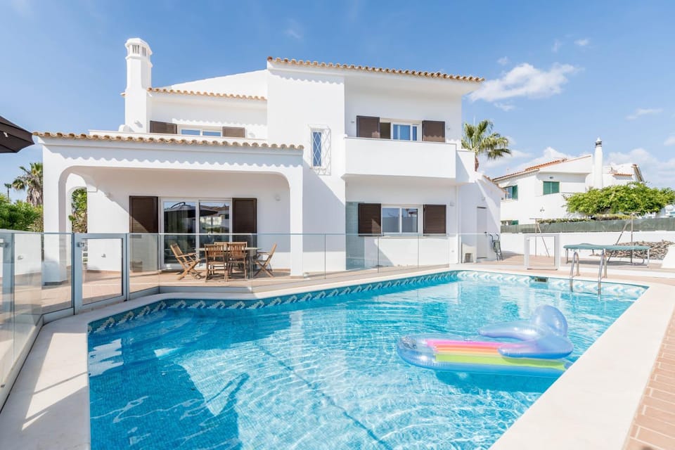 Property building, Living room, Swimming pool