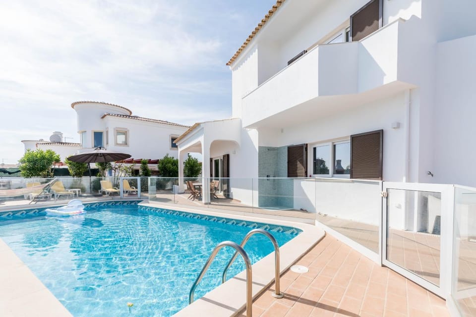 Property building, Living room, Swimming pool
